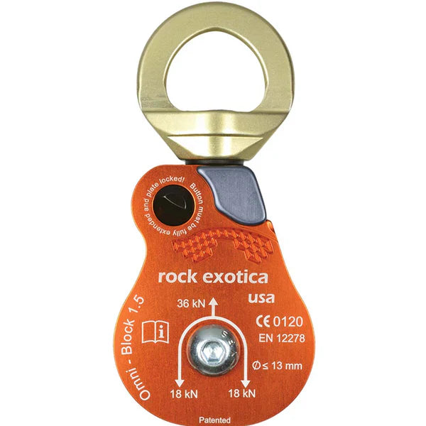 Omni-block. Orange climbing pulley with gold metal carabiner on a white background, branded 'rock exotica'.